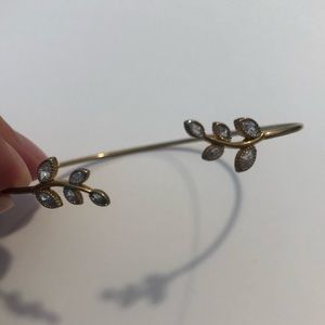 Gold bracelet with rhinestones